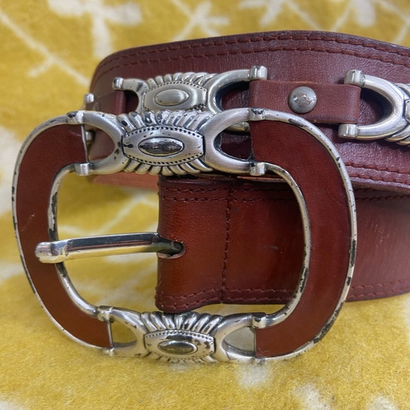 Made in Spain heavy silver tone brown leather belt.